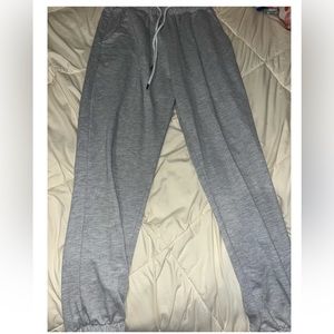 gray joggers either a small or a medium